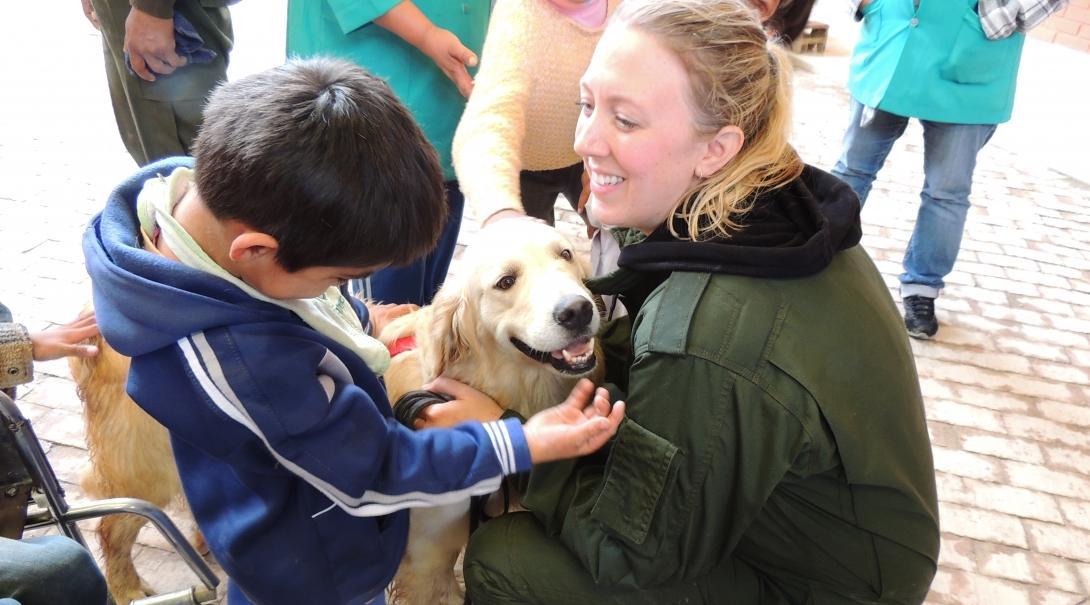 Happy family adopting a dog